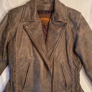 Women’s medium brown leather jacket with zip out liner. New condition